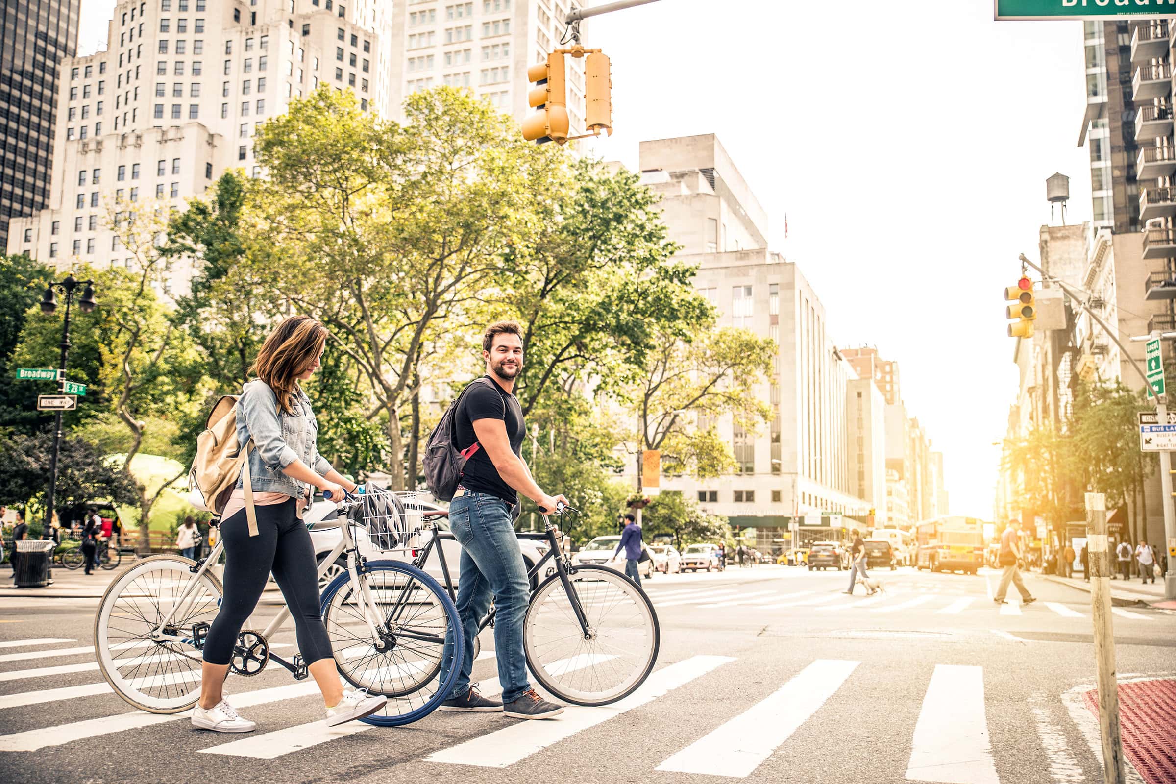 crossing-the-road-with-bikes Couple of cyclist in New York crossing the road.