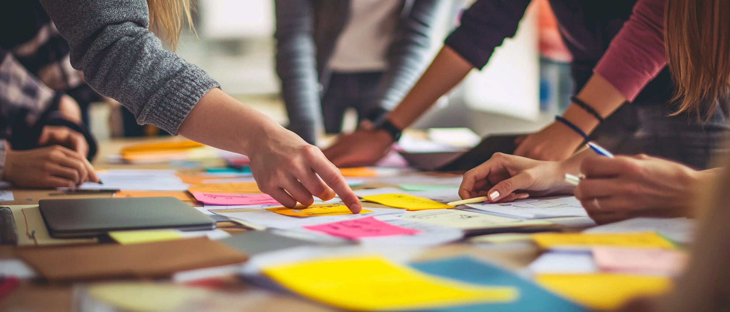 Employees brainstorming new product ideas during a creative work session