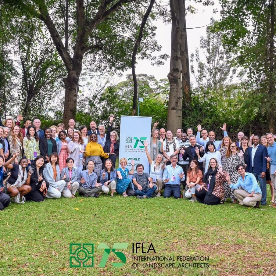 Group of IFLA world congress attendees posing outside in Nairobi, Kenya